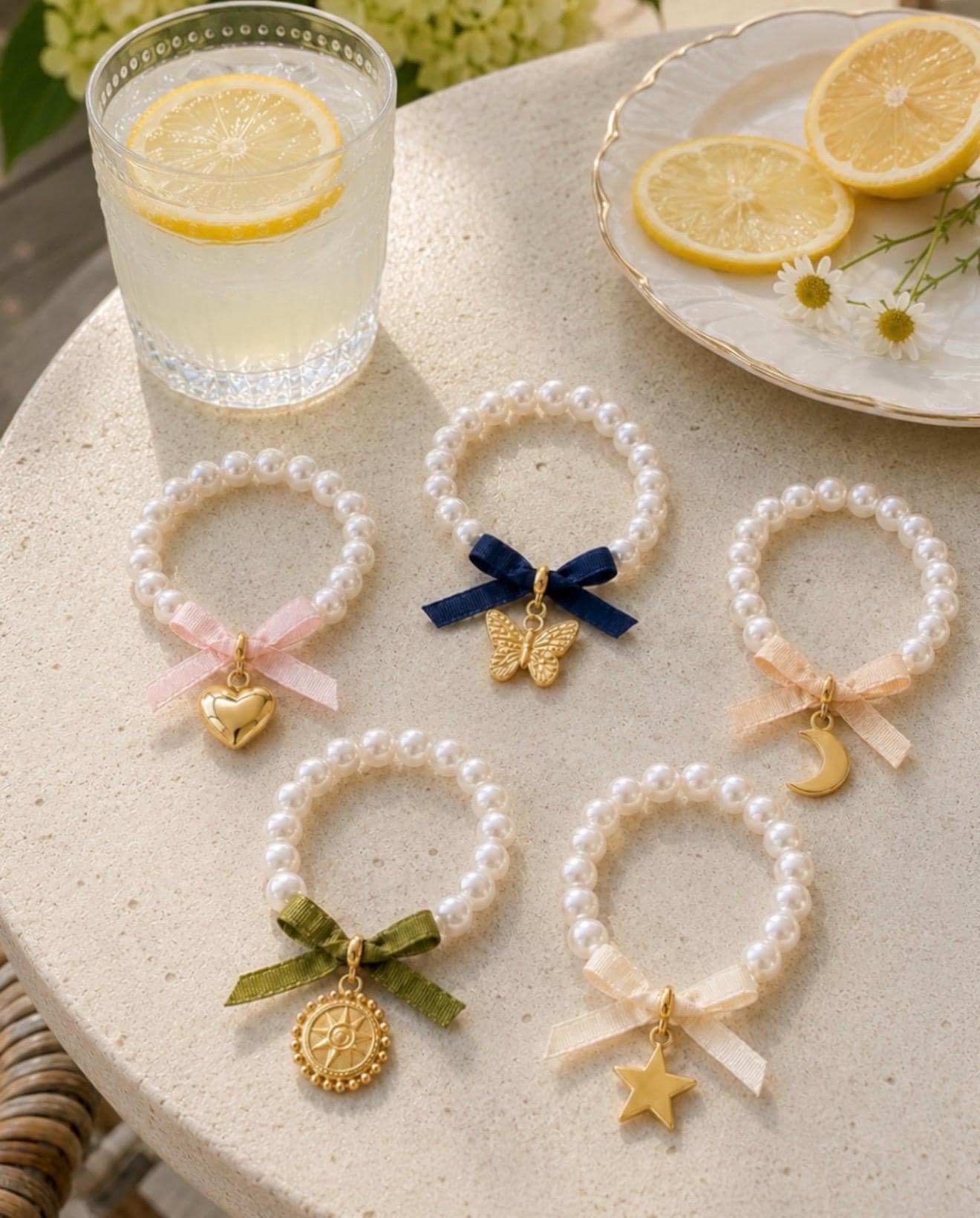 Pearl Charm Bracelet, Gold Tone, Bow Accent, Heart, Butterfly, Moon, Sun, Star Charms